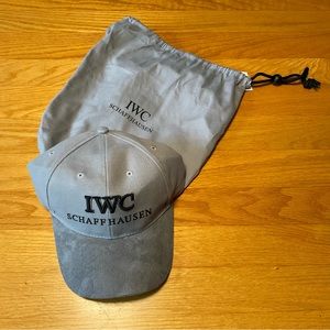New IWC (INTERNATIONAL WATCH COMPANY) ball cap with carry bag.